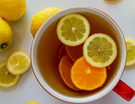 Orange and lemon slices in a bowl